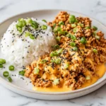 Ground Turkey Rice Bowls with spicy Bang Bang Sauce garnished with vegetables