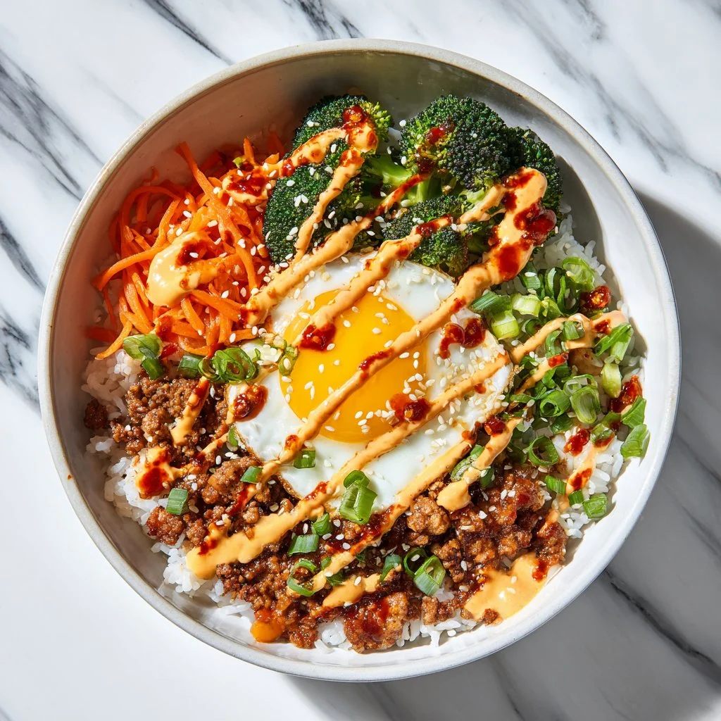 Zesty Bang Bang Ground Turkey Rice Bowls with colorful veggies and sauces