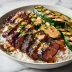 grilled steak bowl with creamy sauce and grilled z 2026 05 06 185907 1